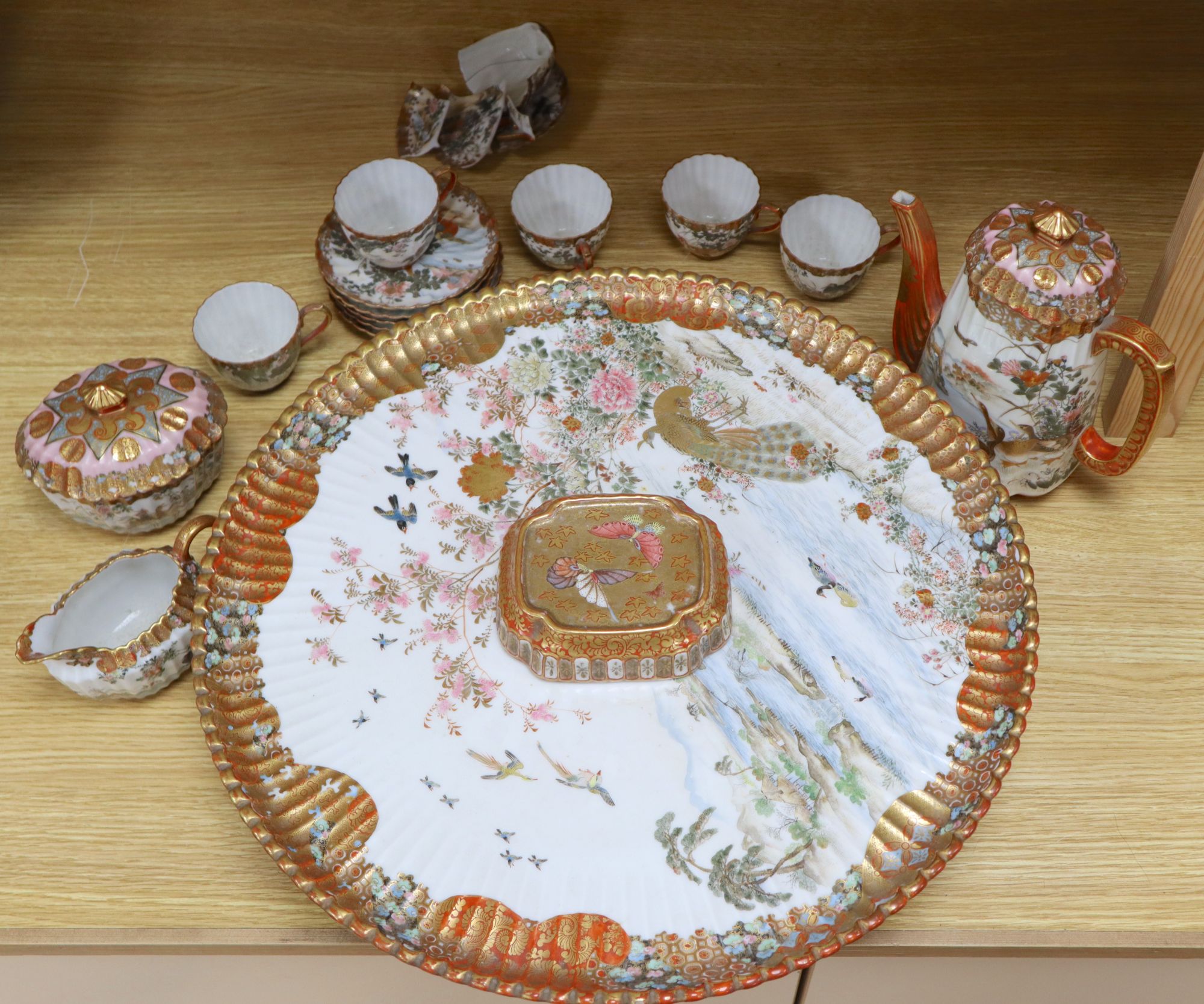 A Kutani part coffee service, with tazza tray base, largest diameter 45cm